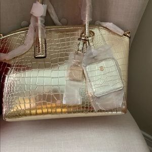 Brand new Gold handbag